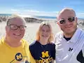 Diane and her family smiling together on vacation, guest testimonial profile picture