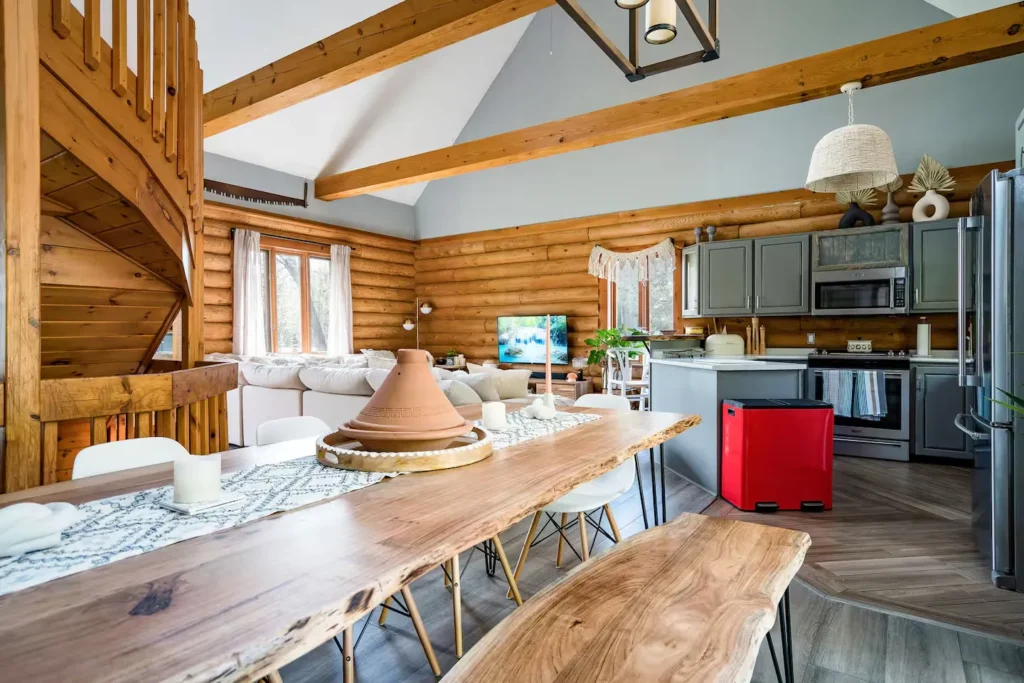Open concept kitchen and dining space at Cozy Cabin Inn