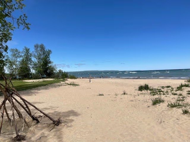 Christie Beach Conservation Area sandy shoreline and clear water view
