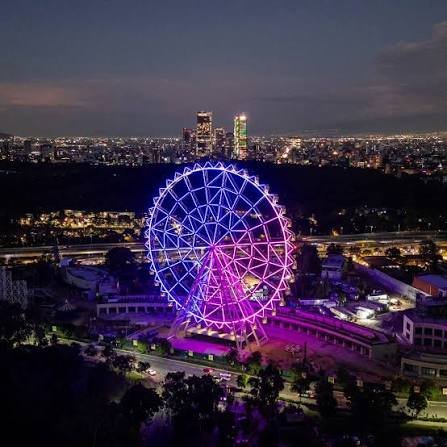 Polanco upscale district and illuminated Ferris wheel night view in Mexico City