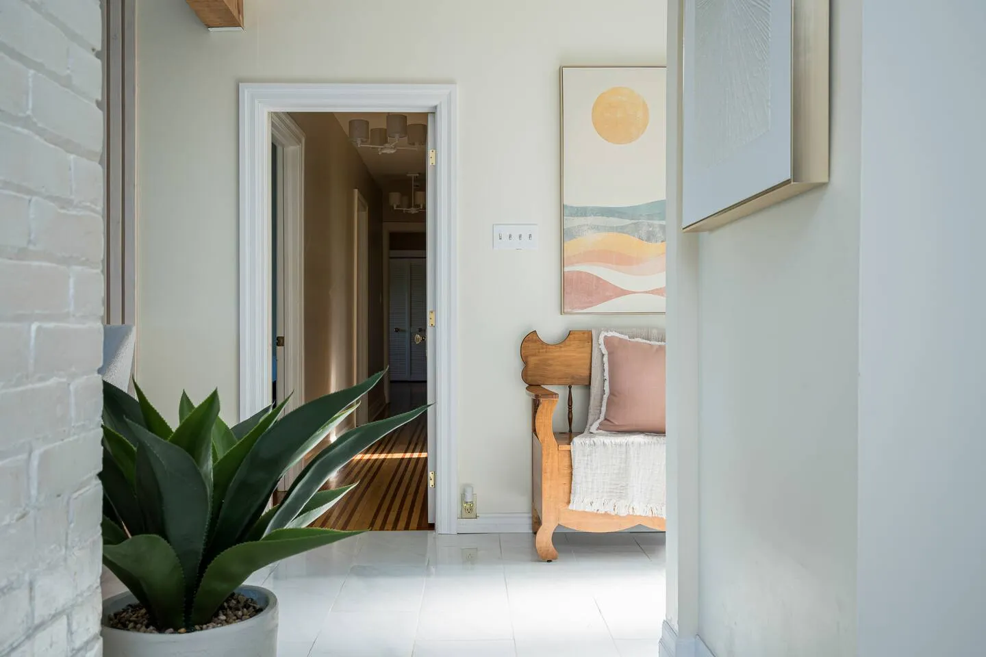 Elegant interior hallway leading through The Bluffs Bayhouse