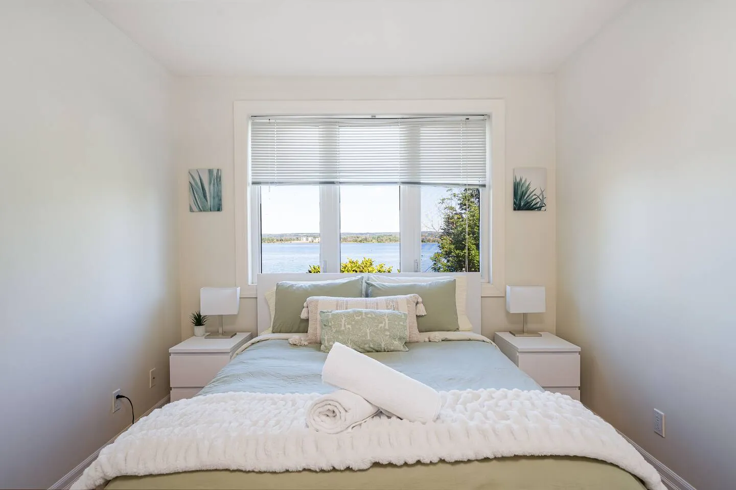 Well-lit bedroom area at The Bluffs Bayhouse