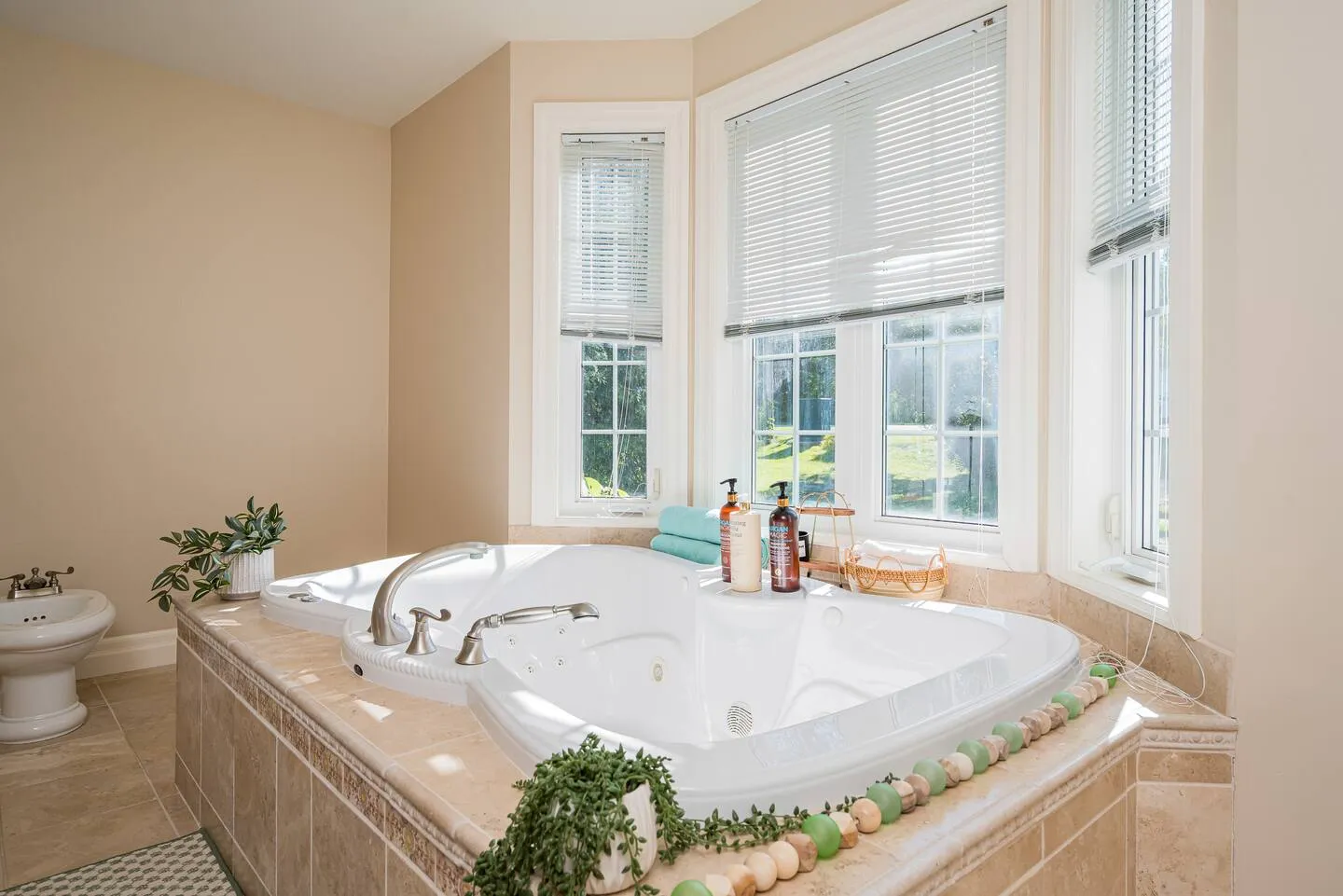 Bathroom interior with large tub at The Bluffs Bayhouse