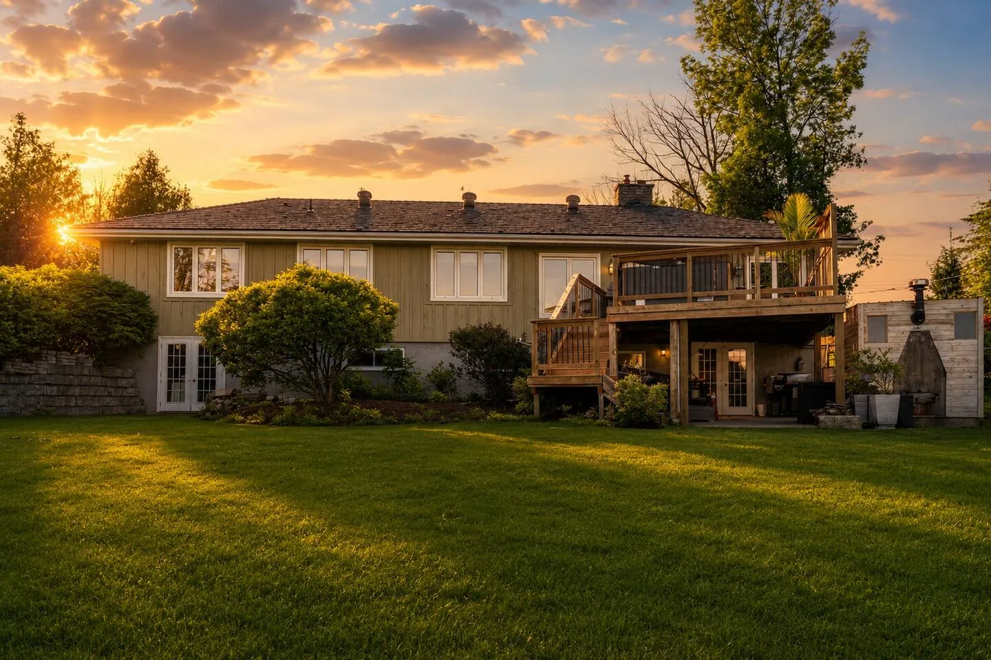 : Beautiful exterior of The Bluffs Bayhouse during sunset