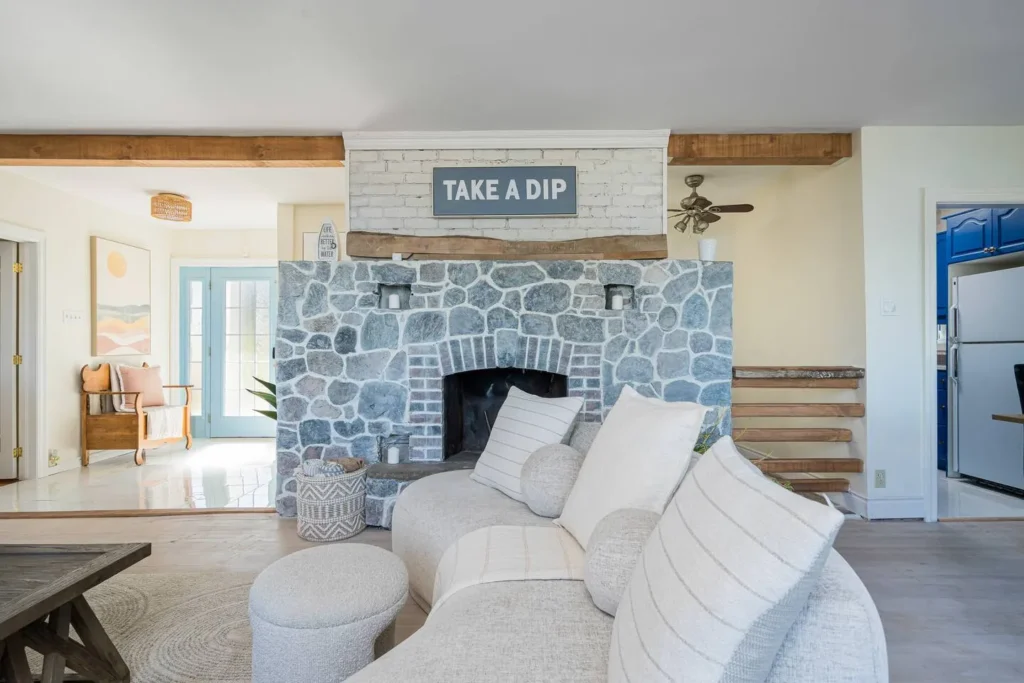 Cozy living room space with fireplace at The Bluffs Bayhouse