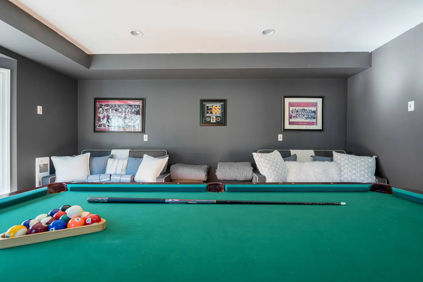Game room interior with pool table at The Bluffs Bayhouse