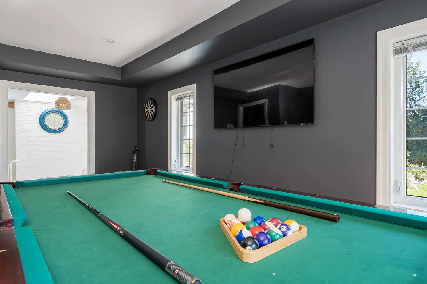 Entertainment area with pool table at The Bluffs Bayhouse