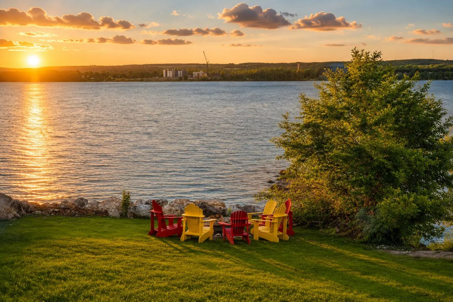 Sunset view over the lake from The Bluffs Bayhouse