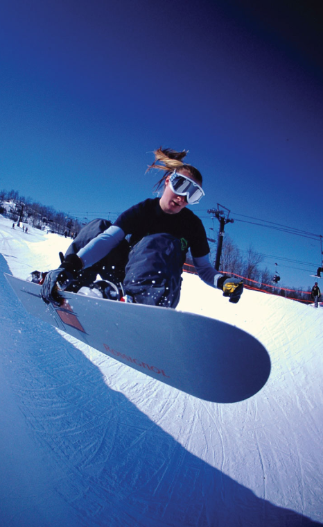 Skiing and snowboarding action and winter sports at Blue Mountain