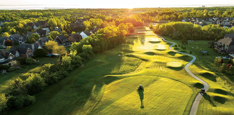 Monterra Golf at Blue Mountain aerial sunset view over rolling green fairways
